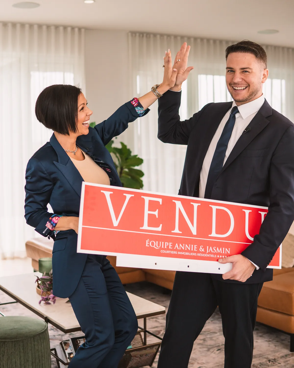 Annie and Jasmin celebrate a sold property